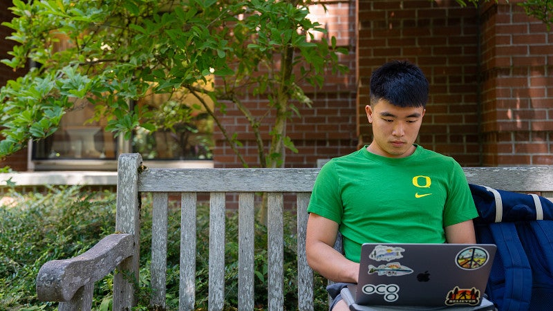 student working on computer