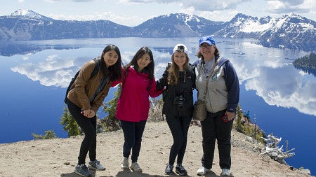 Students standing in front of Crater Lake