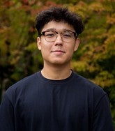 Head shot of Aziz
